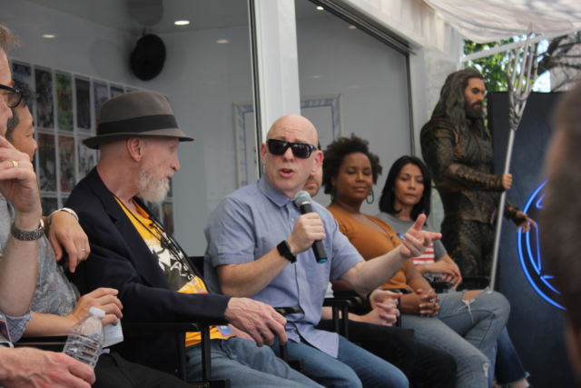 Brian Michael Bendis, seated with Frank Miller to his right and writers Nadria Tucker and Lina Patel to his left. 