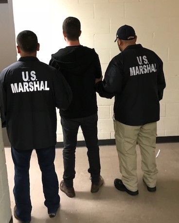 US Marshals shared this image of Wilson arriving into custody in Houston.