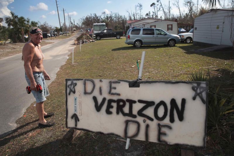 A Florida man sets up a sign that says, 