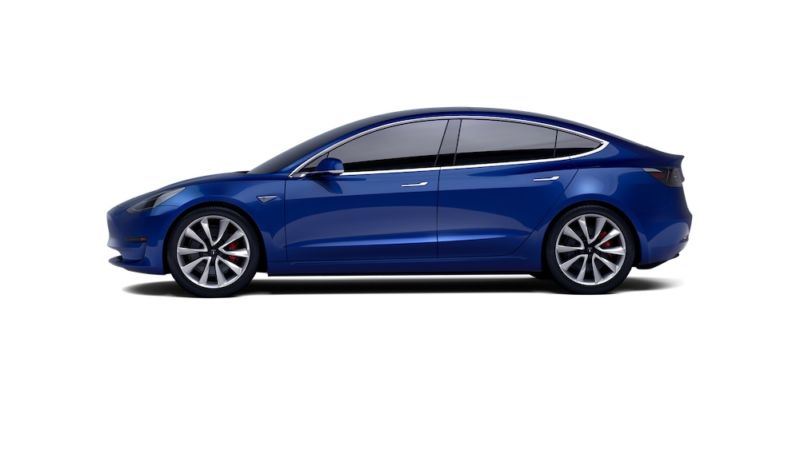 Image of a blue sedan against a white background.