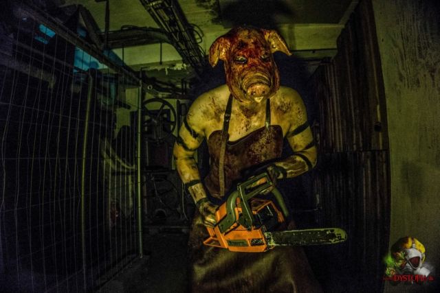 A "scare actor" terrifies guests by threatening them with a chainsaw. Or, in psych-speak, he does so via "a behavioral display of violent hostility and dissonance-inducing mask."