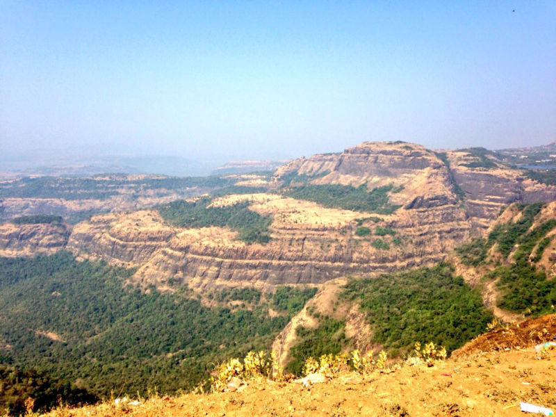 Did these enormous layered volcanic deposits arise through many big eruptions or a few massive ones?