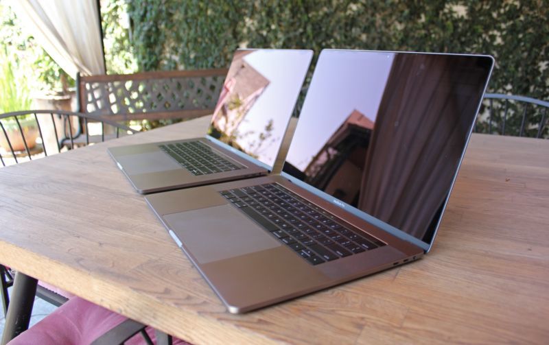 The 2017 and 2018 15-inch MacBook Pros side-by-side. Each has a butterfly keyboard.