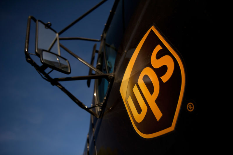 A United Parcel Service Inc. (UPS) logo is displayed on the door of a truck 