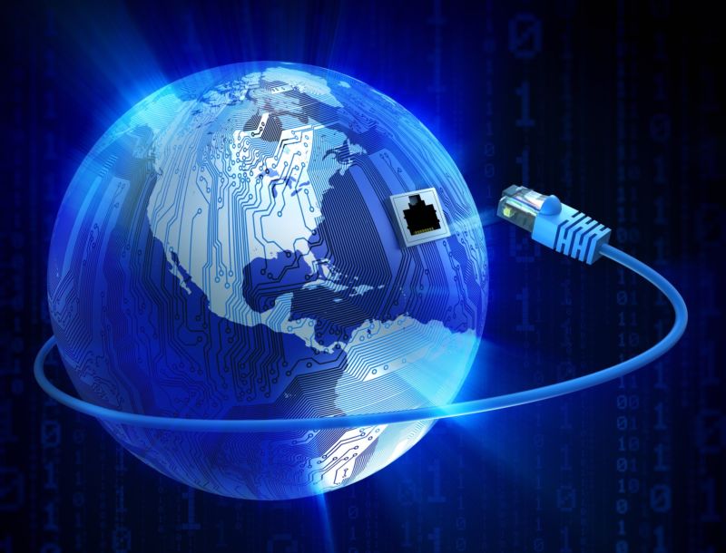 An illustration of Earth, with circuits covering North America and an Ethernet cable being plugged into the planet.