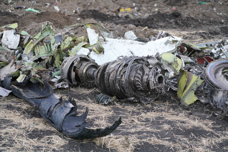 Parts of an engine and landing gear lie in a pile after being gathered by workers during the continuing recovery efforts at the crash site of Ethiopian Airlines flight ET302 on March 11, 2019 in Bishoftu, Ethiopia. (Photo by Jemal Countess/Getty Images)