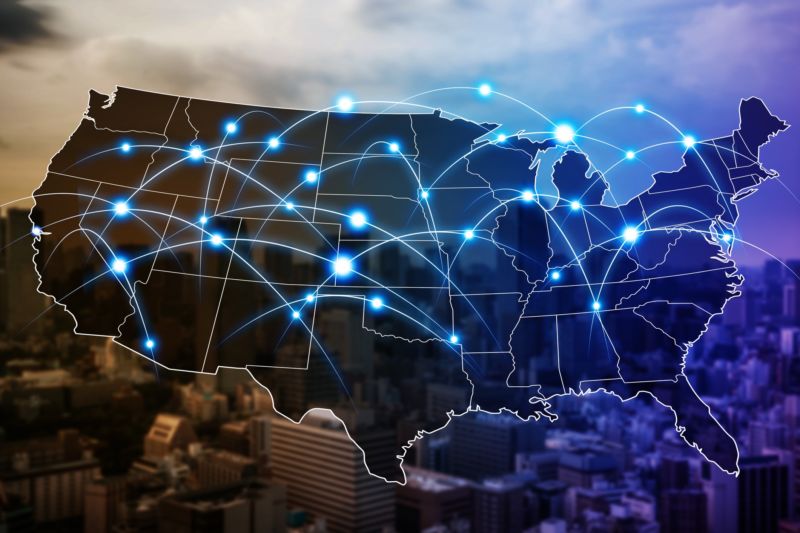 A US map with lines representing communications networks.