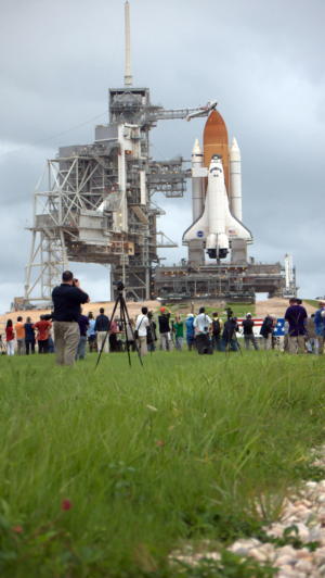 Reporters queued up to get a picture of the launch site.