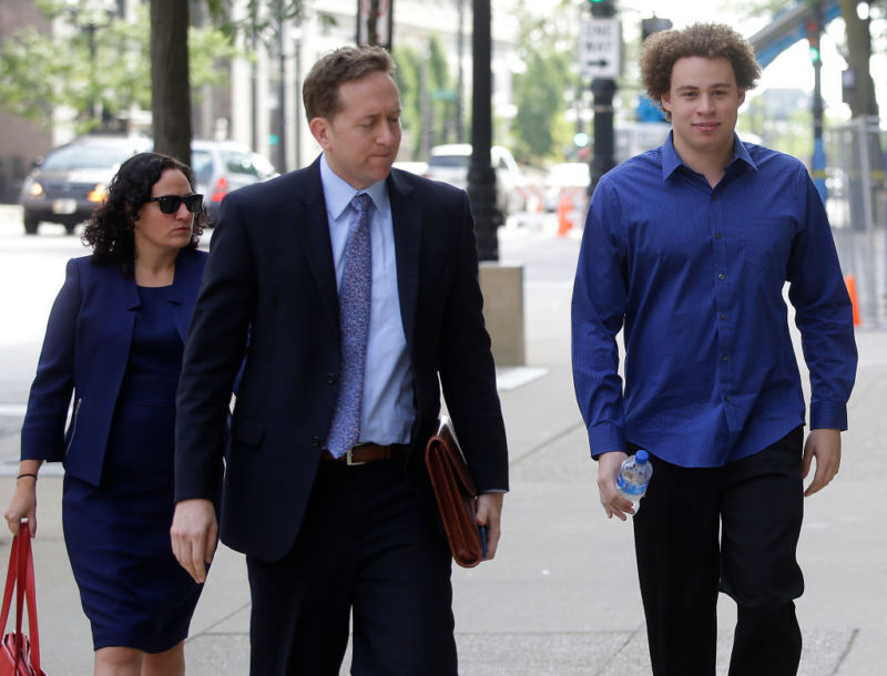 Hutchins, right, walks to court with his lawyers in 2017.