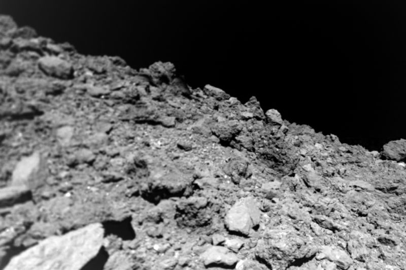 Ryugu's rubble-pile surface, taken by MASCOT shortly before it hit and started bouncing.