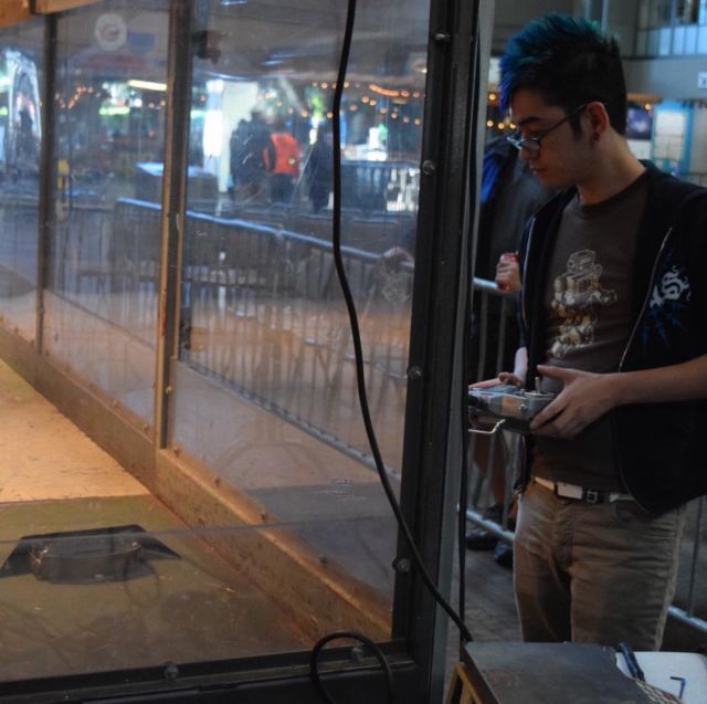 Henry Aird running a robot through combat drills.