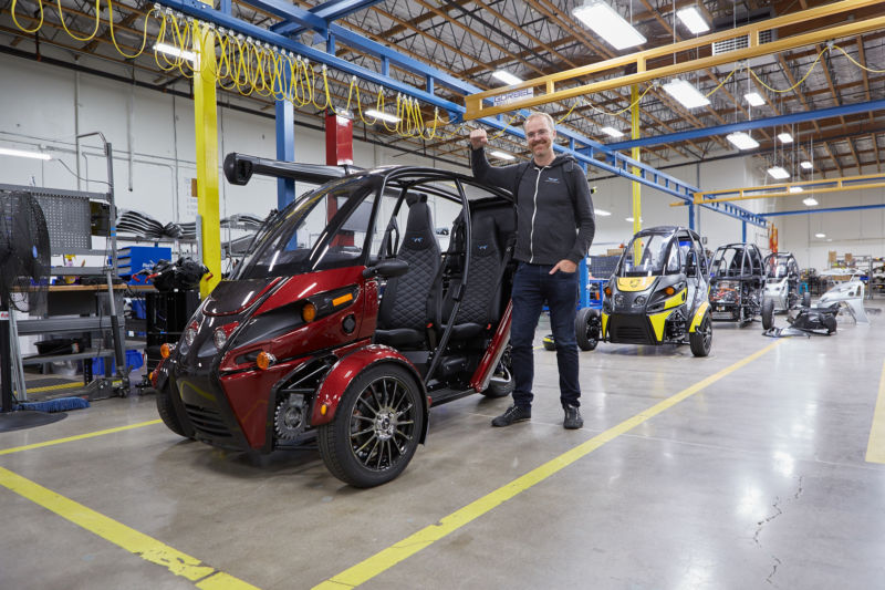 Mark Frohnmayer, Arcimoto's founder and President, with an Evergreen Edition at the company's Oregon factory.