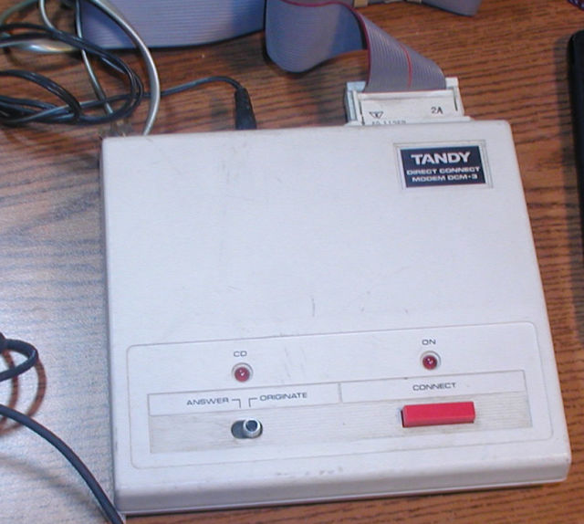 Sure-Fi's RF chirp tech is about as fast as this 300 baud Tandy DCM-3 modem. I bought one of these cheap in 1984 and rewired an RS-232 cable to convert between its pinout and my Apple //c's.