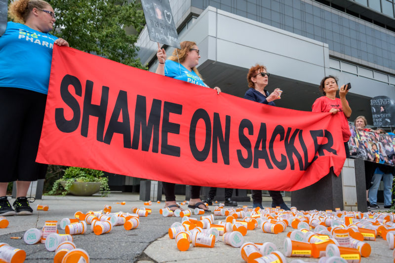 PURDUE PHARMA, STAMFORD, CT, UNITED STATES - 2019/09/12: Members of P.A.I.N. (Prescription Addiction Intervention Now) and Truth Pharm staged a protest on September 12, 2019 outside Purdue Pharma headquarters in Stamford, over their recent controversial opioid settlement.