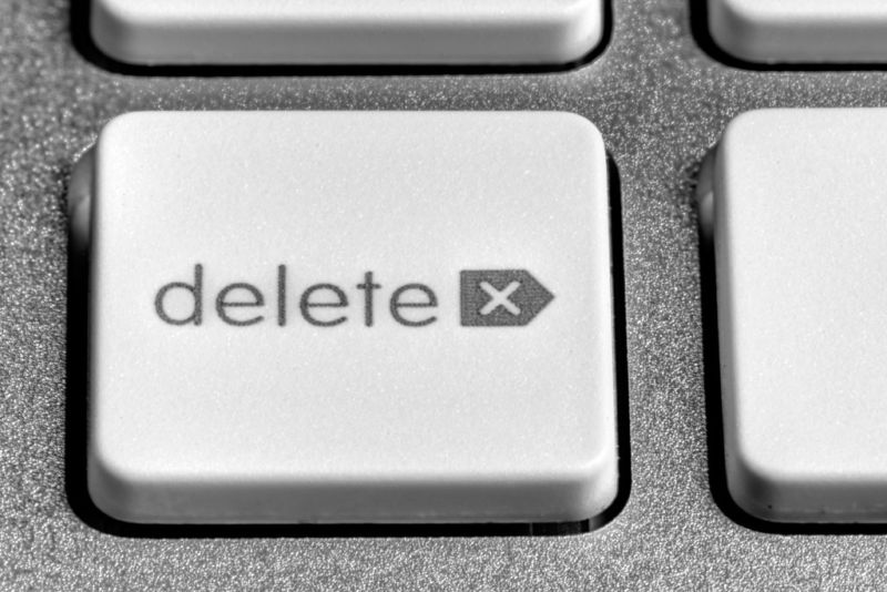 Extreme closeup photograph of a computer delete key.