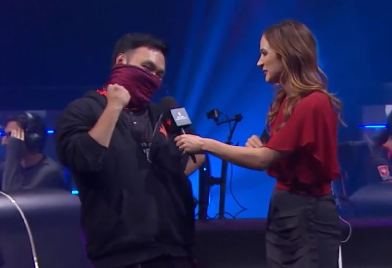 Lee Shi Tian pumps his fist during an interview in which he highlighted the ongoing protests in his native Hong Kong.