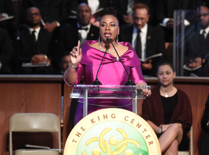 Bernice King, daughter of Dr. Martin Luther King Jr., speaks at a podium.