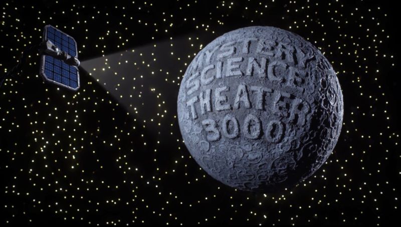 Screenshot from Mystery Science Theater 3000's opening credits in which the show's title is projected an unconvincing moon.