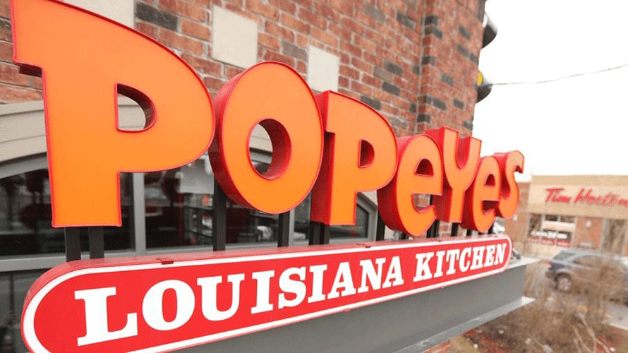 a sign that says popeyes louisiana kitchen