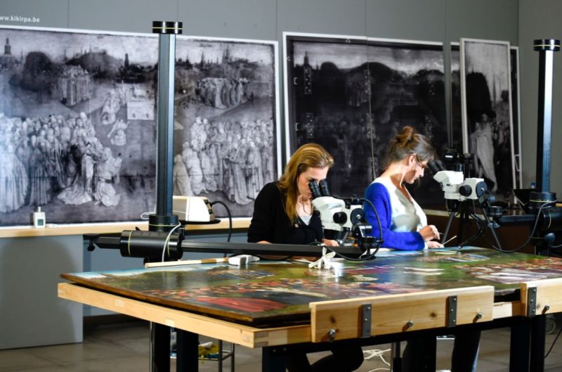 Restorers of the Royal Institute for Cultural Heritage remove surpeints and reveal the original of the "Adoration of the Mystic Lamb" altarpiece by the Van Eyck brothers.