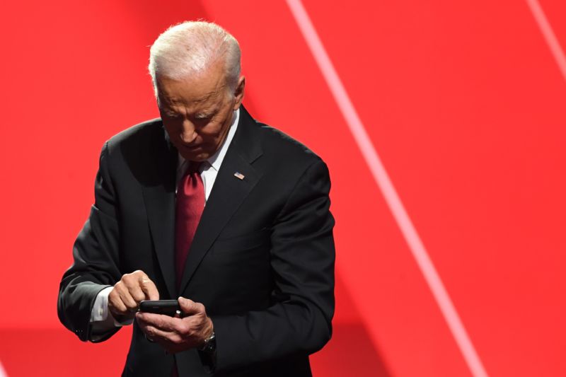 Former Vice President Joe Biden poking at a mobile phone in October 2019.