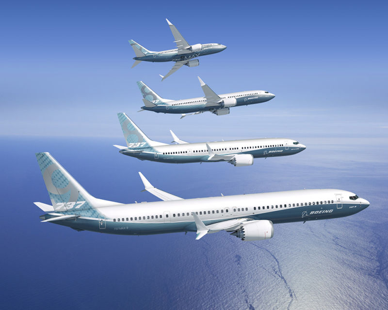 Four Boeing 737 Max planes in the air.