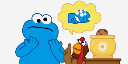 Cookie monster being told about handwashing