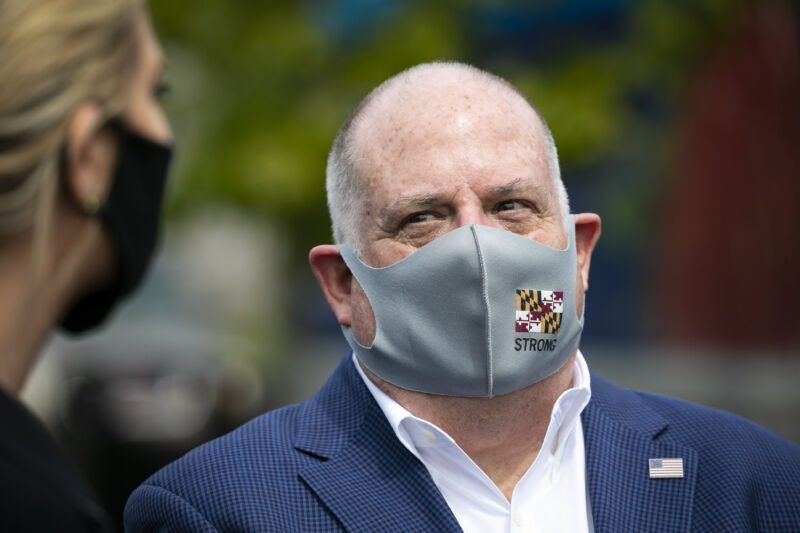 Larry Hogan, governor of Maryland, wears a protective mask while talking to Ivanka Trump, senior adviser to US President Donald Trump, during a tour of the distribution center of Coastal Sunbelt Produce in Laurel, Maryland, US, on Friday, May 15, 2020. 