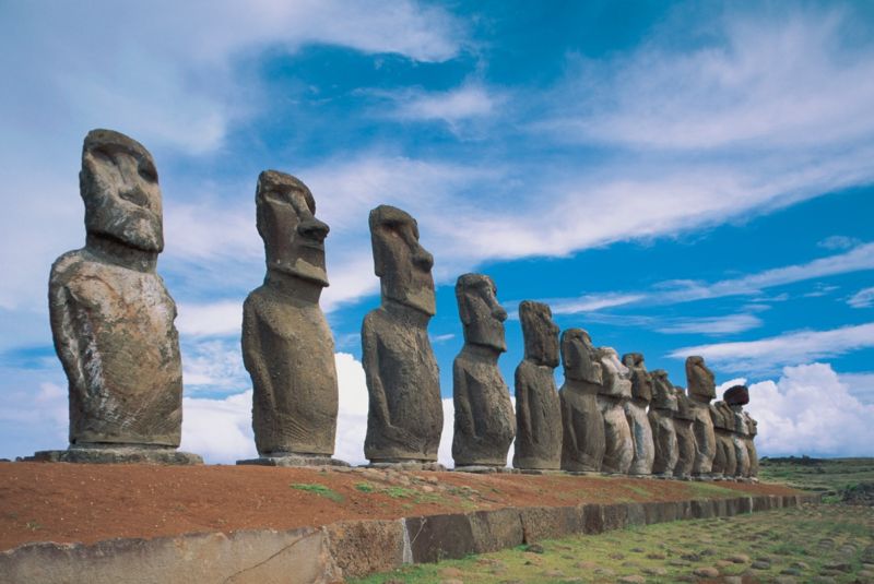 Moai statues in a row, Ahu Tongariki, Easter Island, Chile.