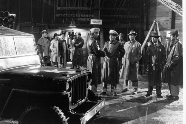 Brian Donlevy, Henry O'Neill, Joseph Calleia, and Hume Cronyn prepare to test the first atomic bomb in <em>The Beginning or the End</em>