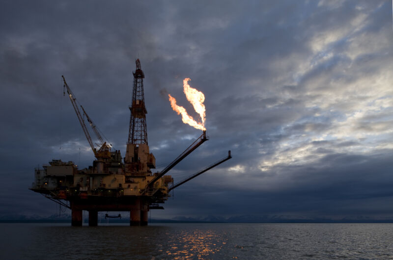 A natural gas flare from an offshore oil drilling rig in Cook Inlet, Alaska.