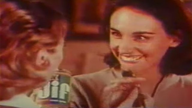 Two moms holding a Jif peanut butter container