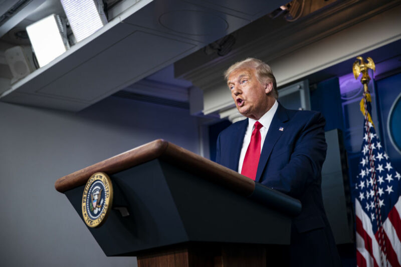 Image of President Trump speaking from behind a lectern.