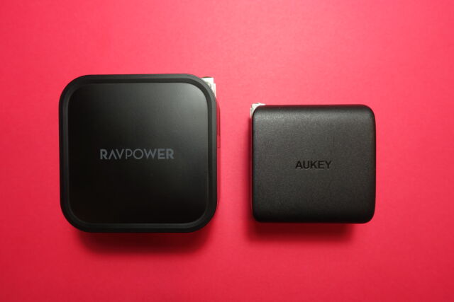 RavPower's RP-PC128 (right), next to Aukey's Omnia PA-B4 wall charger.