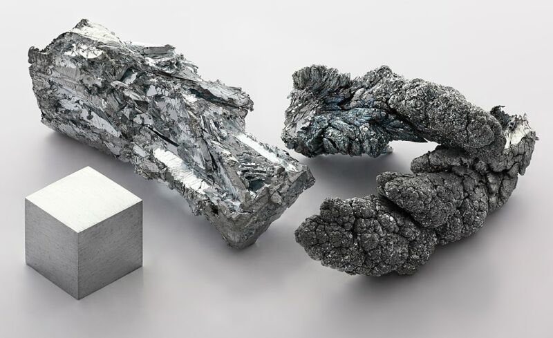 Image of three chunks of zinc metal.