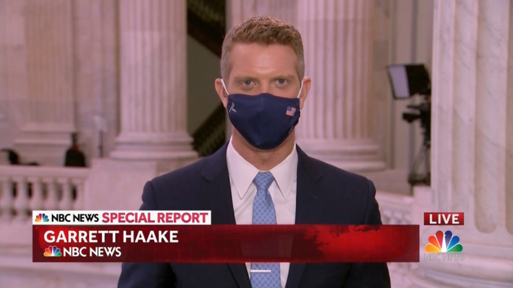 clip from nbc news special report of garrett haake at the capitol with a blue mask on