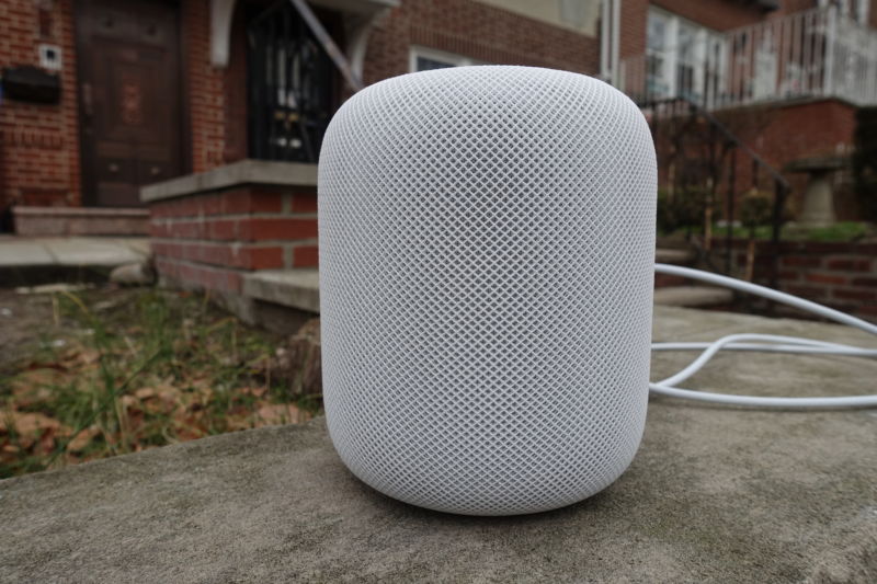 A smart speaker about the size of a mason jar.