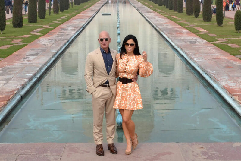 Jeff Bezos and his girlfriend Lauren Sanchez pose for a picture during their visit at the Taj Mahal in January 2020.