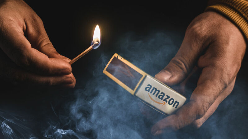 Illustration of smoke, a lit match in a person's hand, and a matchbox with an Amazon logo.