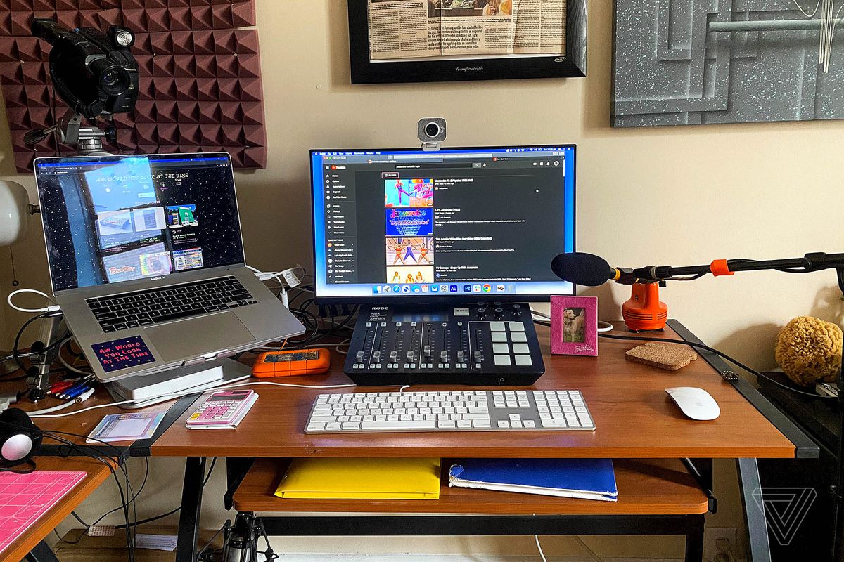 Two screens: a 24-inch monitor and a MacBook Pro.