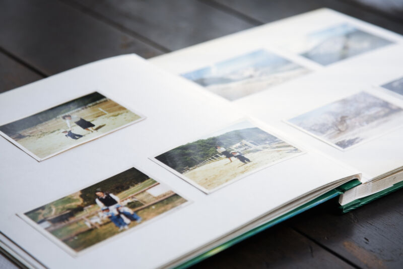 Stock photo of photo album open on a table.