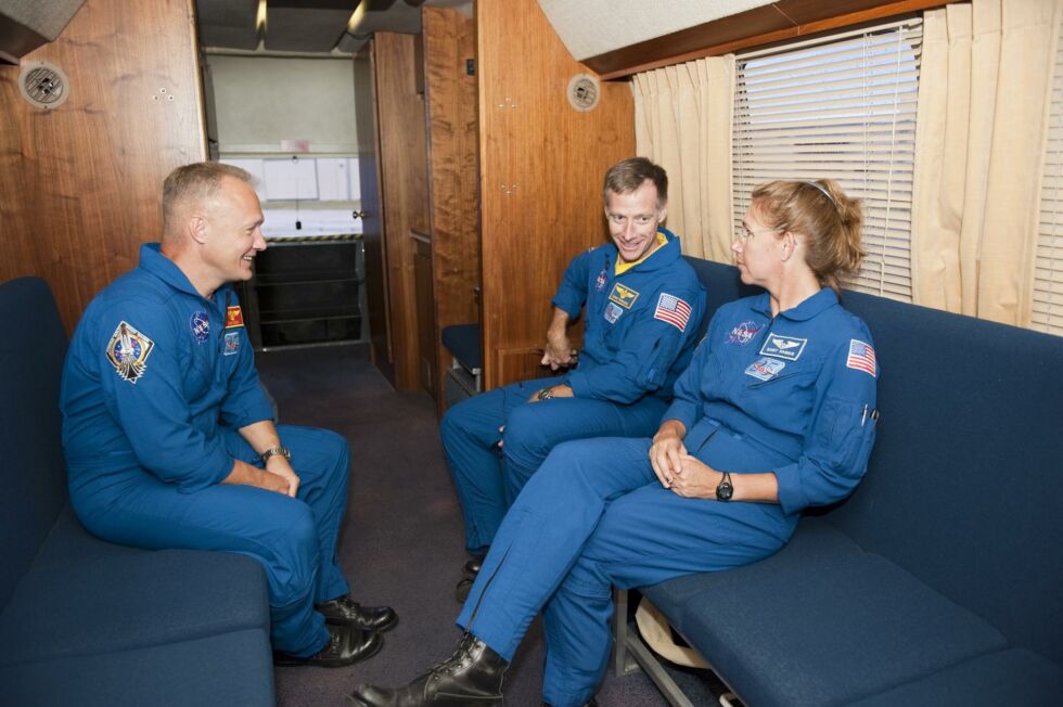 NASA astronauts Doug Hurley, Chris Ferguson, and Sandy Magnus inside the Astrovan in 2011. 