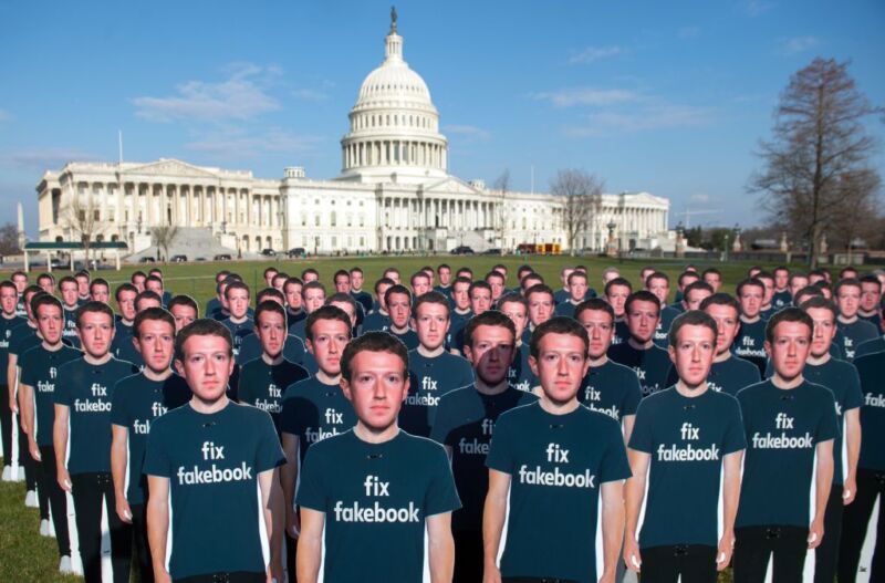 One hundred cardboard cutouts of Facebook founder and CEO Mark Zuckerberg stand outside the US Capitol in Washington, DC, April 10, 2018.