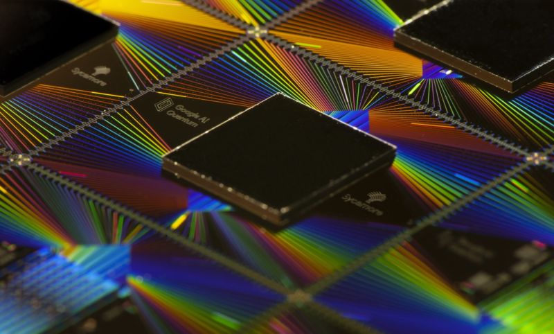 Image of a chip above iridescent wiring.