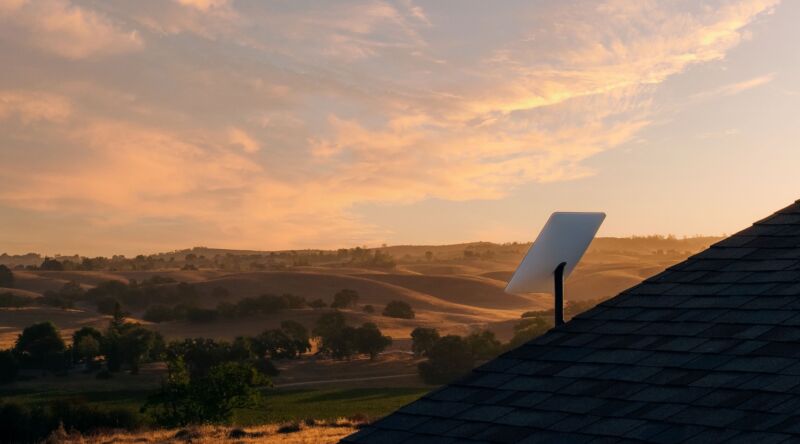 A Starlink satellite dish mounted on a roof.