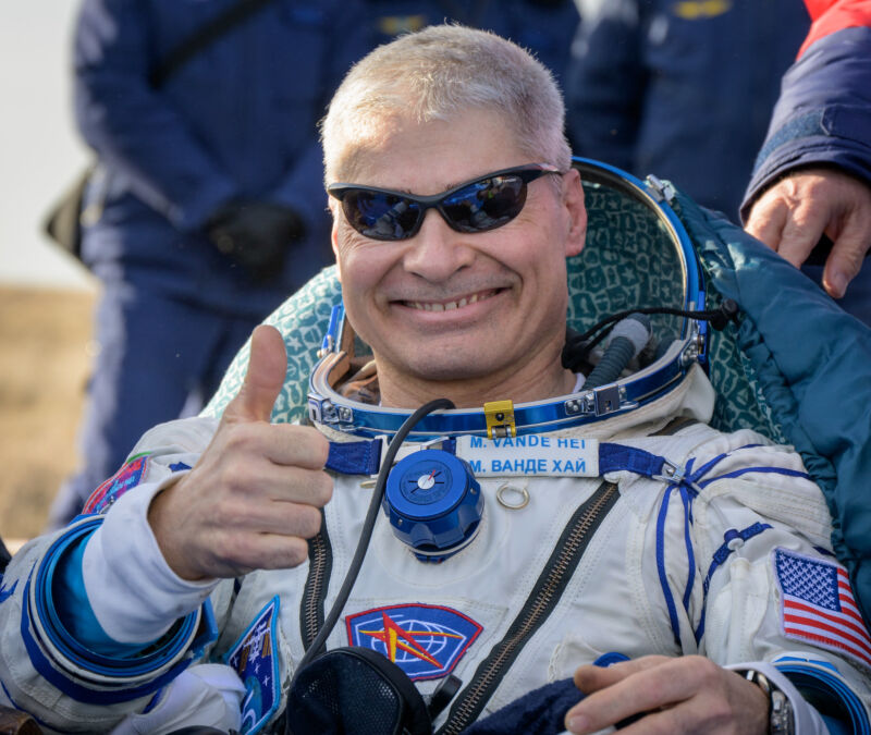 NASA astronaut Mark Vande Hei flashes a thumbs-up shortly after landing on Wednesday.