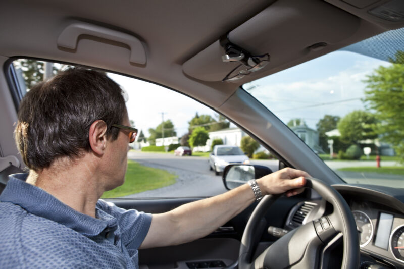 A driver turns left at an intersection. 