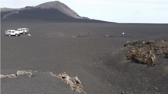 Digging a trench to bury the DAC cable.