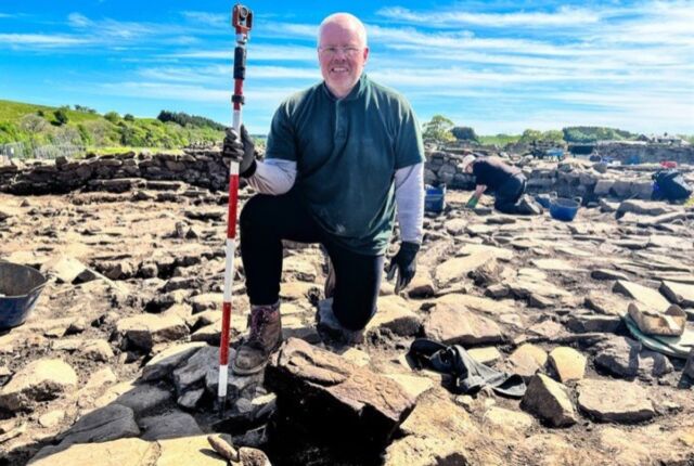 Retired biochemist Dylan Herbert was volunteering at the excavation site when he came across the carved stone.