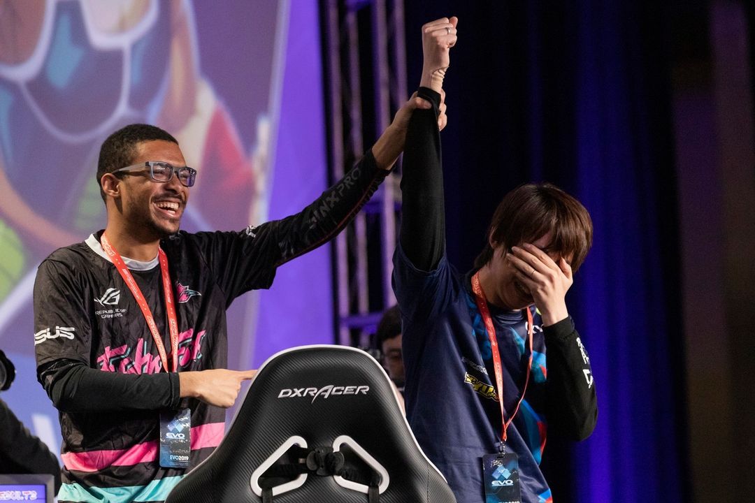 Dominique “SonicFox” McLean congratulates Goichi “GO1” Kishida for winning the grand finals of Dragon Ball FighterZ at Evo 2019